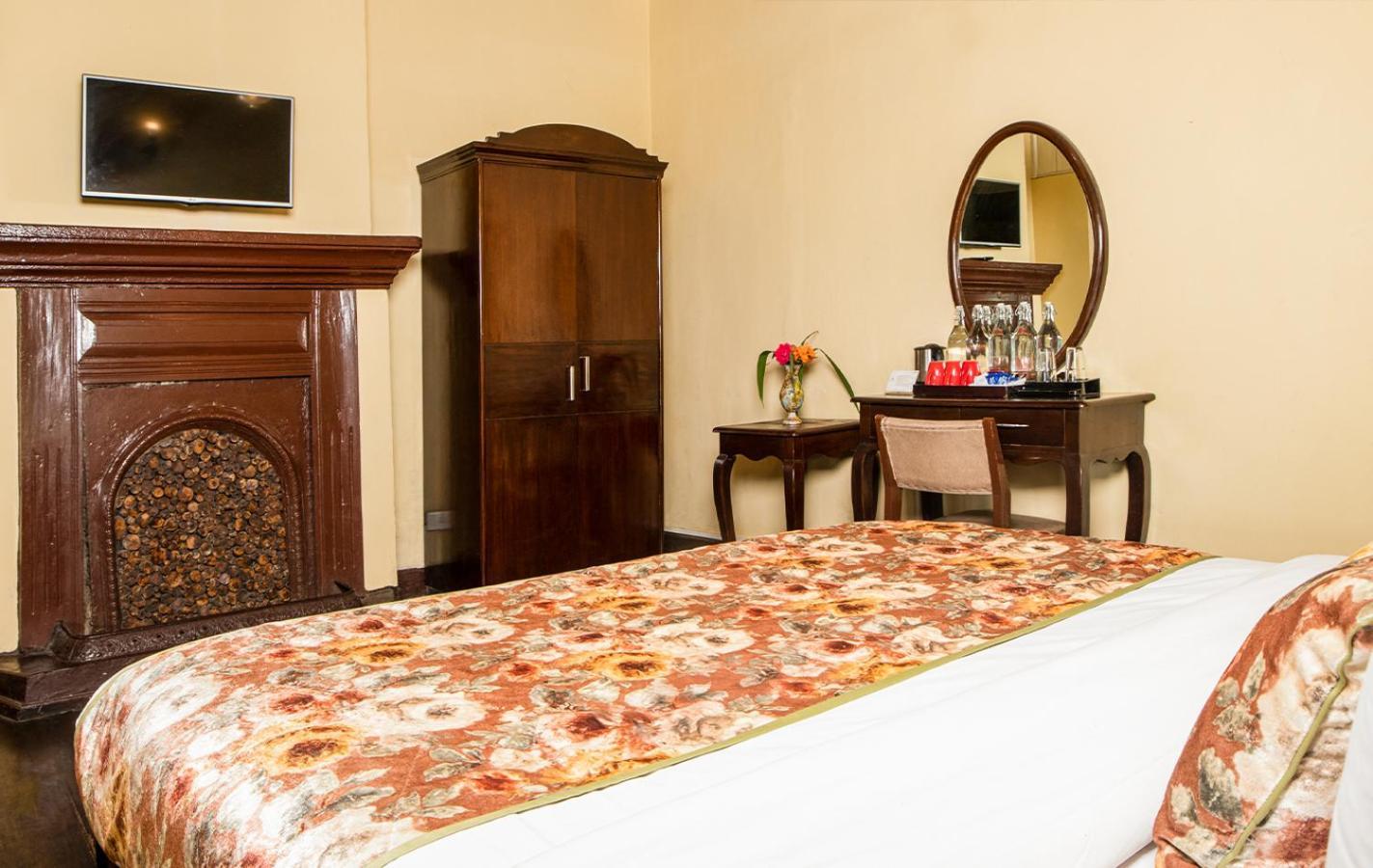 Summit Swiss Heritage Resort & Spa Дарджилинг Номер фото